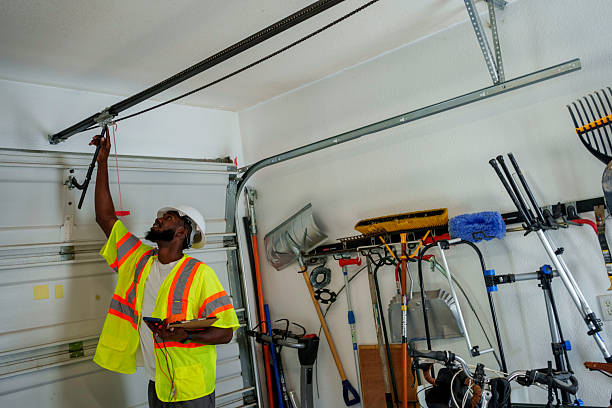 Professional Garage Door Panel Replacement technician working in Morton County County, ND